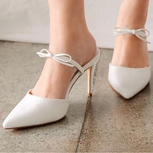 Sagaa White Pointed-Toe Slingback Pumps